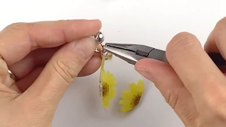 transform pierced earrings into clip on earrings in seconds, Pinching closed
