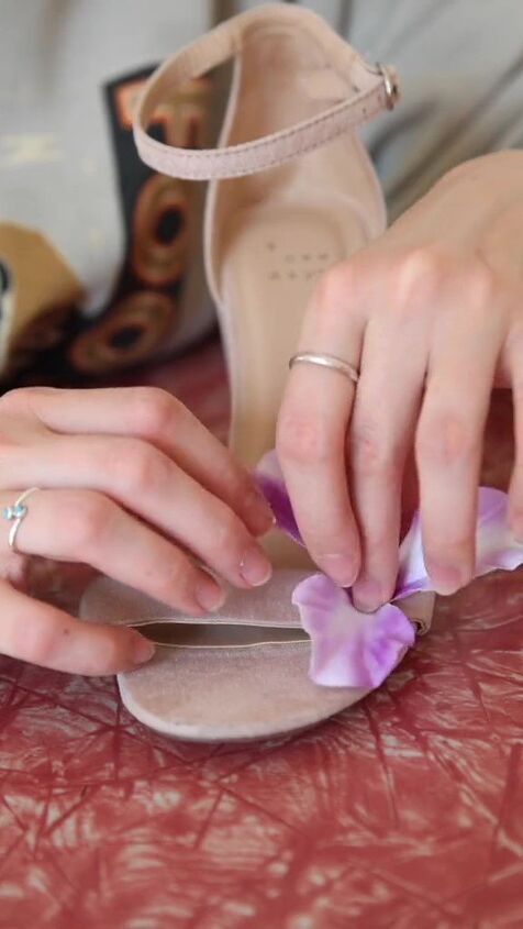 grab some walmart faux flowers for this amazing summer heel diy, Gluing the flowers on