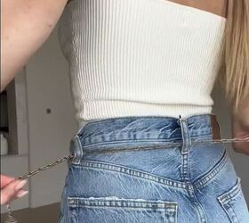 use a necklace to make your jeans fit better, Placing necklace through loops