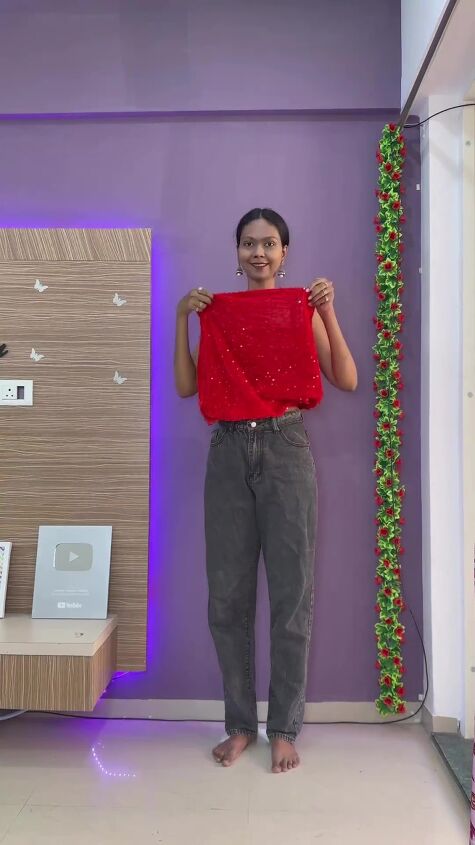 easy fashion hack turns your skirt into a top, Holding skirt upside down