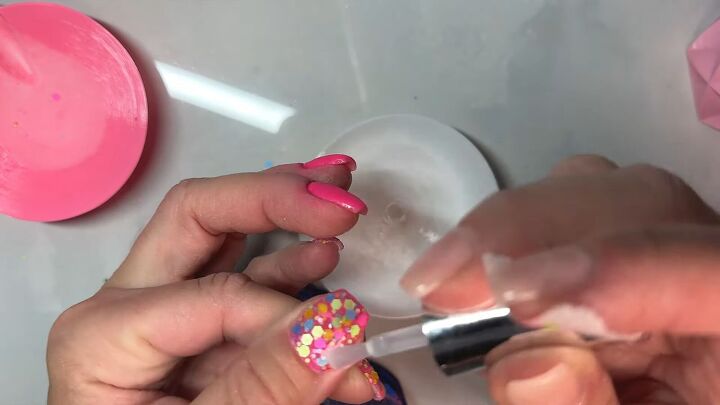 barbie pink nails, Applying clear polish