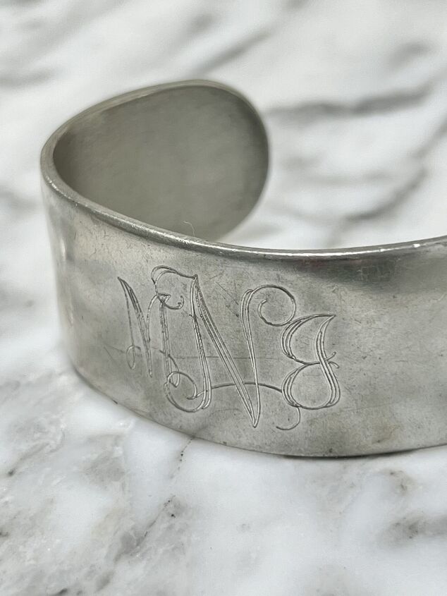 tips on how to wear a cuff bracelet with style, A vintage monogrammed cuff bracelet