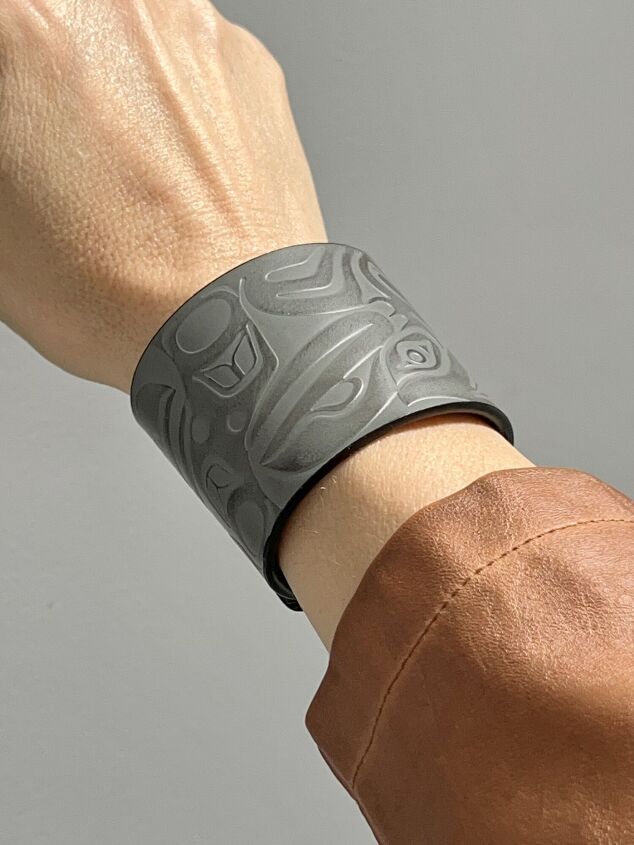 tips on how to wear a cuff bracelet with style, How to Wear a Cuff Bracelet with Style An embossed grey leather cuff bracelet