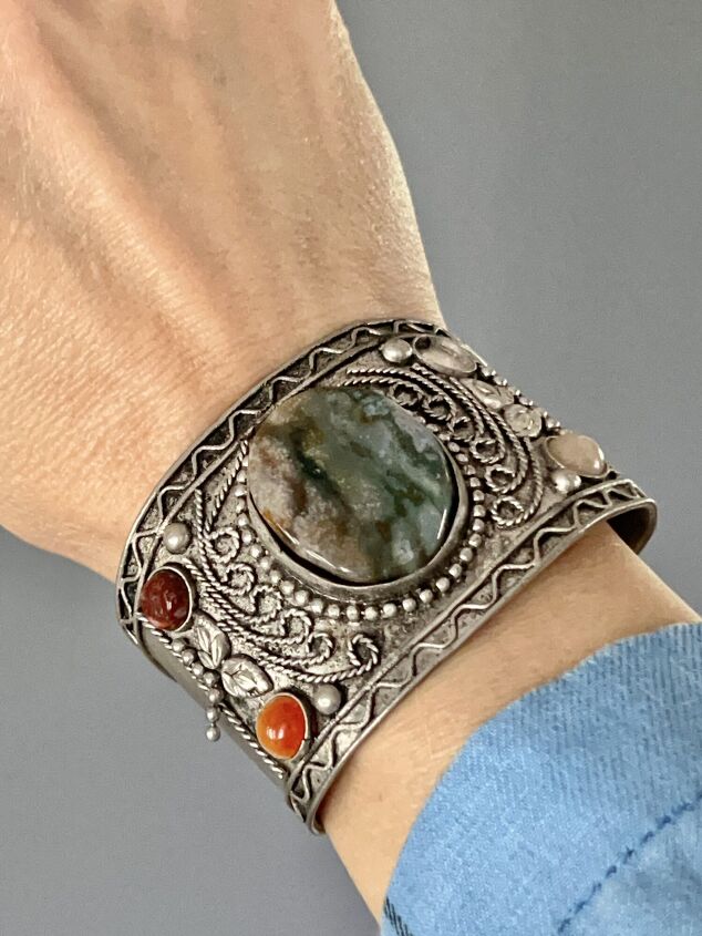 tips on how to wear a cuff bracelet with style, How to Wear a Cuff Bracelet with Style A cuff bracelet filled with colorful stones