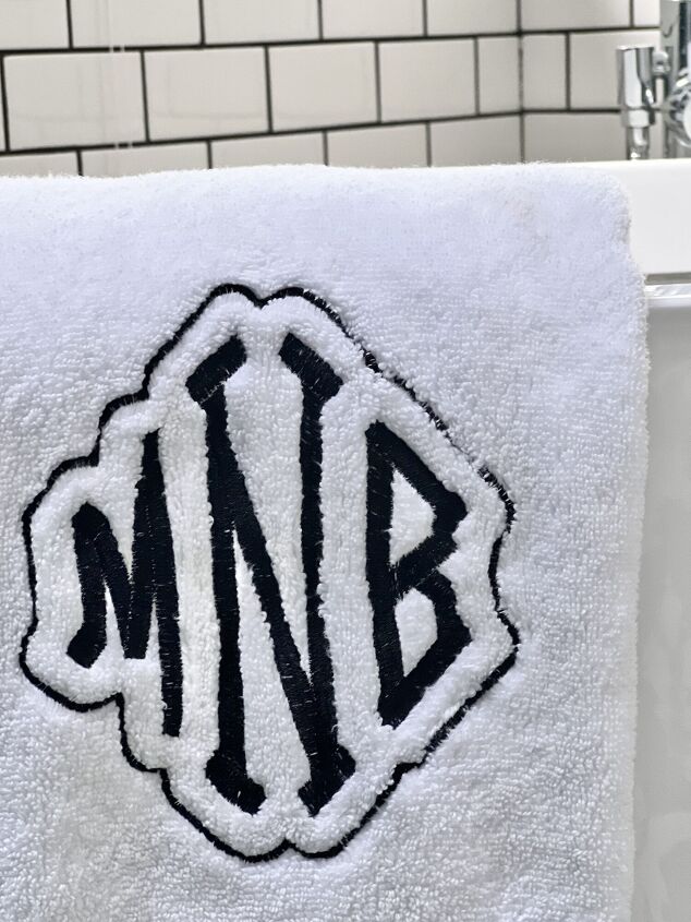 ideas for how to wear monogrammed clothing with style, A monogrammed bath towel