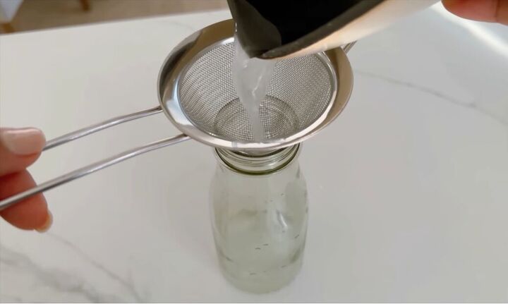 Straining Rice Water How to Make Fermented Rice Water for Healthy Hair | Upstyle