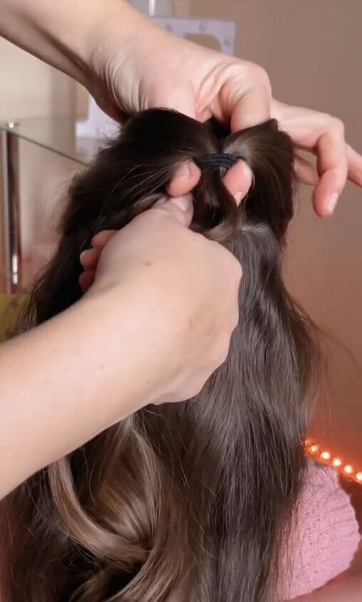 hack to get more volume in your ponytail, Pulling ponytail through hole