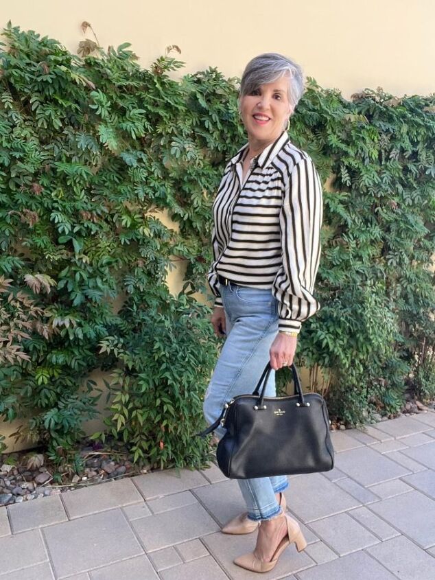 four spring date night outfits, In this second spring date night outfit I am wearing a black and white somewhat silky striped long sleeved shirt It is paired with vintage jeans and a black doctor s bag fr