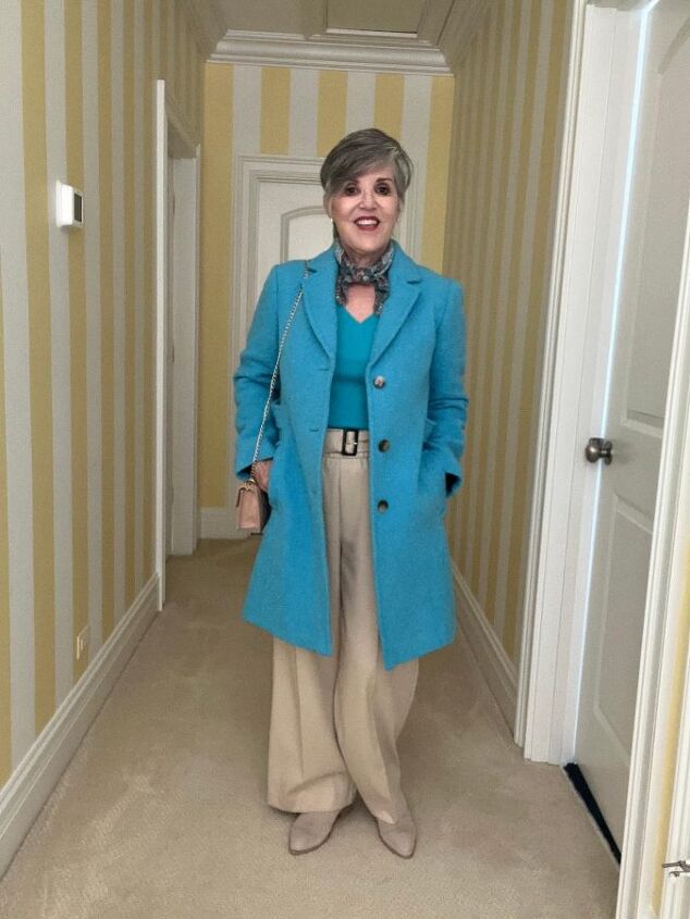 what to wear in chicago in spring, this is a turquoise wool coat over a similarly hued cashmere sweater My trousers are wide leg tan ones and my booties are tan suede My bag is tan and quilted