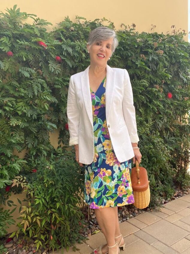 what to wear in chicago in spring, Me in my royal blue floral Maggy London knee length dress and white linen blazer My sandals are light cream ankle straps and my bag is a wicker and leather one from J McLaughlin