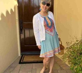 casual mom outfits, I am wearing the tenth of the casual mom outfits I am wearing a darling sleeveless blue yellow and red foulard pattern dress with a central design I added a white cotton cardigan fun earrings nude sandals and oversized sunglasses