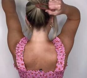 how to get barbie s iconic lifted ponytail, Tying a ponytail