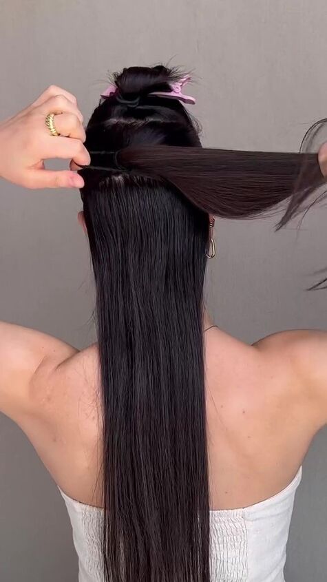 get more volume with this easy hair hack, Tying low ponytail