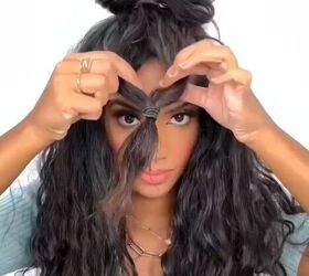 She ties 2 strands of hair like this for this jaw-dropping 1-minute half-up do