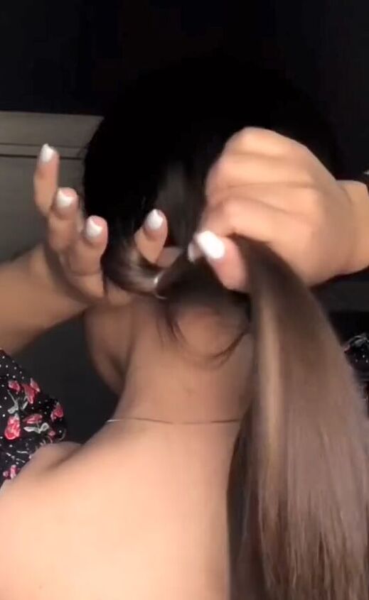 simple easy hairstyle that gives your ponytail a unique touch, Creating topsy tails