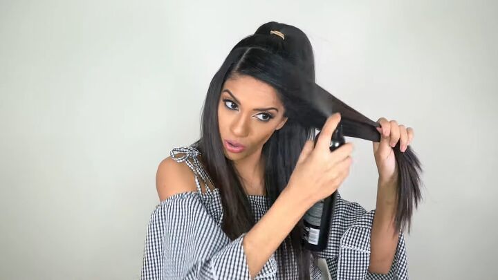 ariana grande high ponytail, Adding hairspray