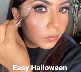 Draw a triangle near your eye to make this spooky and unique Halloween makeup idea