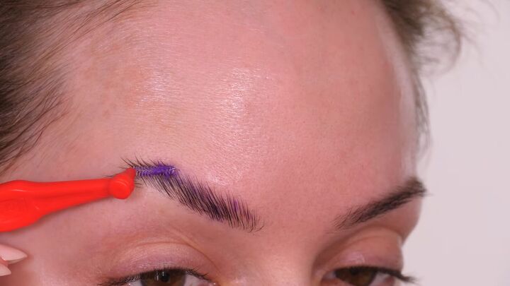 ahsoka tano makeup, Brushing brows with glue