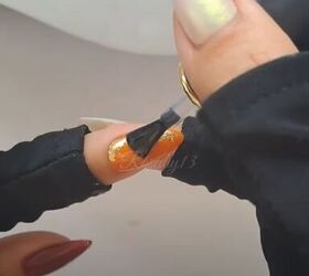 Her manicure looks expensive—but the secret is tiny gold flakes