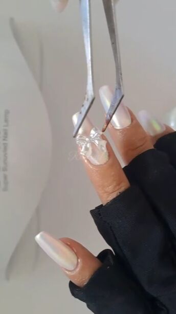 white pearl chrome nails, Adding nail jewel