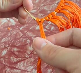 grab some walmart hoops and yarn, Looping yarn around earring