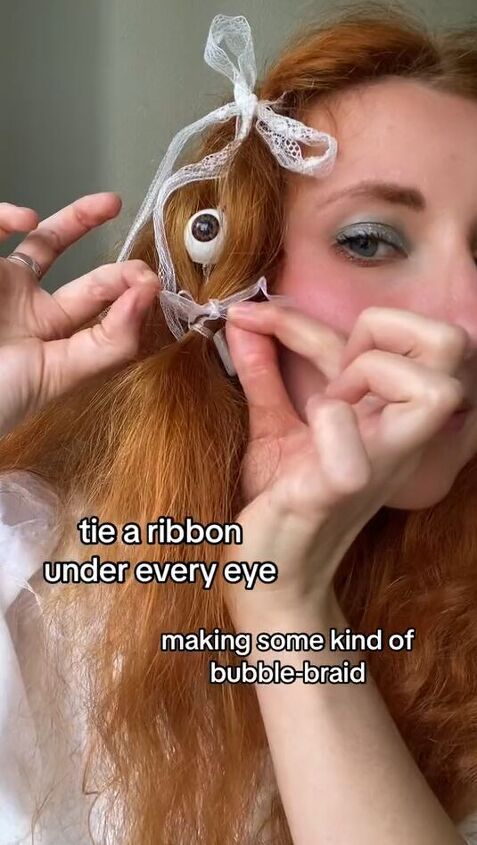 an easy halloween hairstyle to include eyeballs in your hair, Tying bow