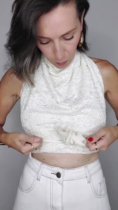 turn your outdated lace long sleeve into a chic new halter top, Tying at front