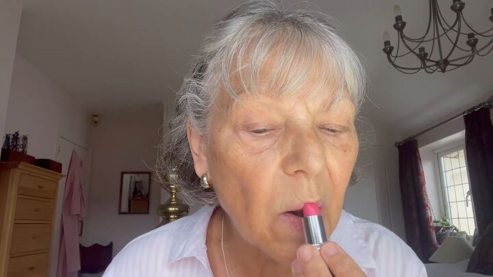everyday makeup look, Applying tinted lip balm