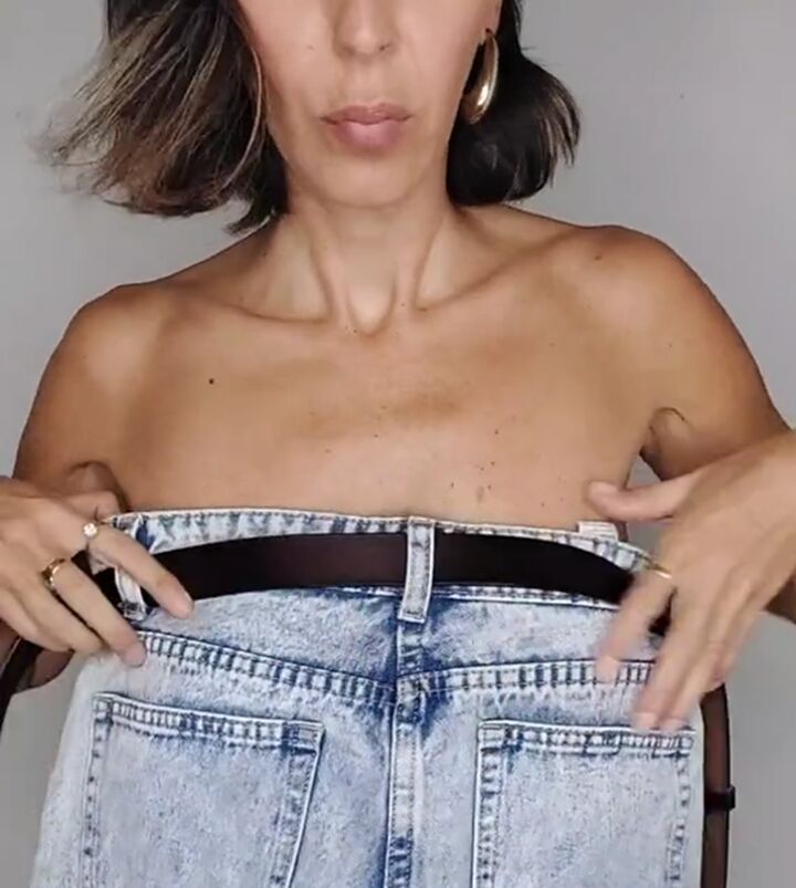 the new way people on tiktok are wearing their jeans, Belting jeans