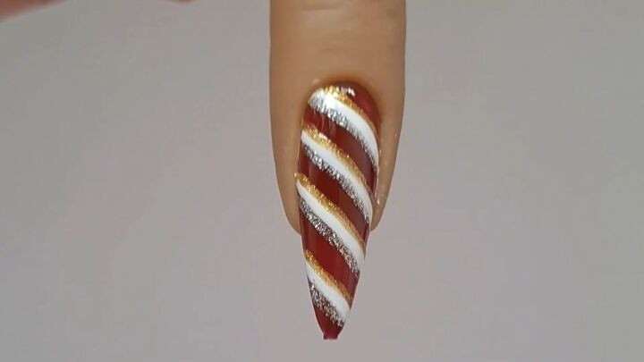 line art nails for christmas, White silver and gold candy cane nails