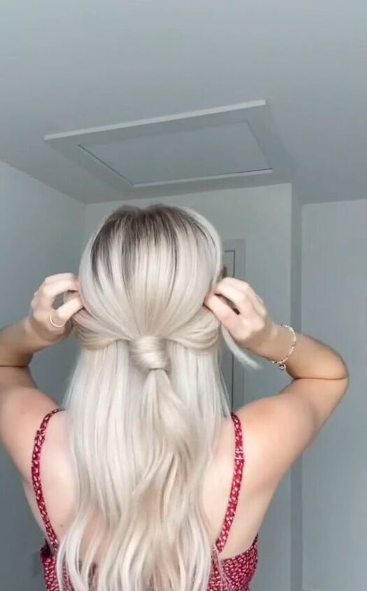 hair hack for getting this knotted look, Pulling on hair