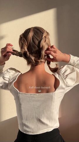 wow check out this amazing braided bun hairdo hack, Pulling braids through eachother