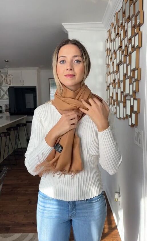 a stylish way to tie your scarf this winter, Pulling scarf through gap