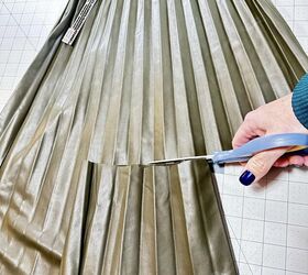 She cut the bottom part off this big faux leather dress for this totally unexpected transformation