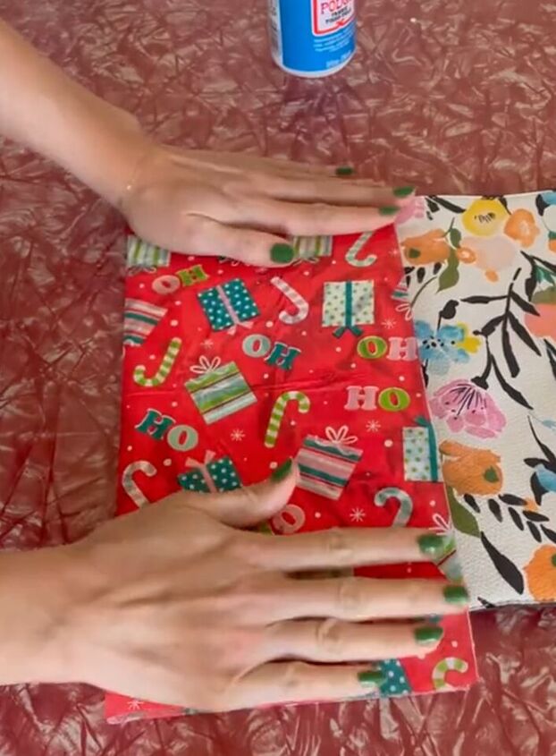 genius way to upcycle a purse with a christmas napkin, Smoothing napkin