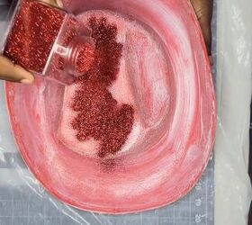 She dumps a bunch of red glitter on a cowboy hat for this surprisingly festive idea