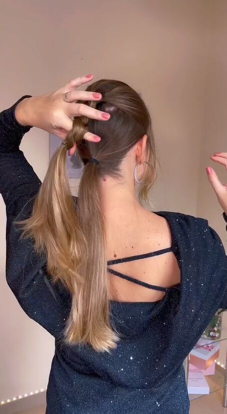 easy effortless look for holiday parties, Pulling ponytail through