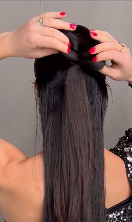 an easy way to add a bow in your hair for valentine s, Dividing bun