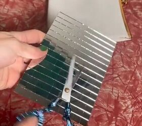 She cut a sheet of stick-on disco mirror tiles for this totally random and exciting idea