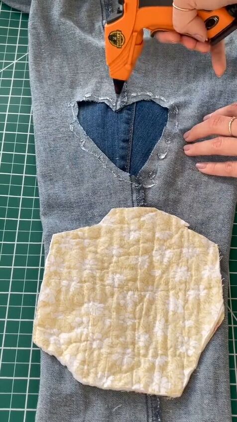 glue a thrifted quilt to your jeans and fall in love with the results, Gluing fabric patch