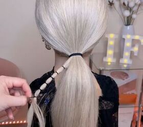 upgrade your ponytail with this unique finish, Adding hair elastics