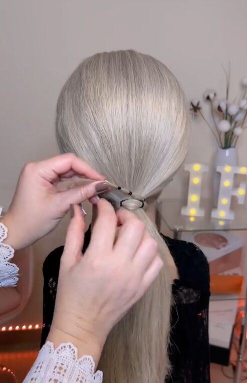 upgrade your ponytail with this unique finish, Wrapping hair