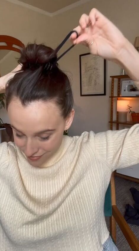 the secret to the perfect messy bun, Securing bun