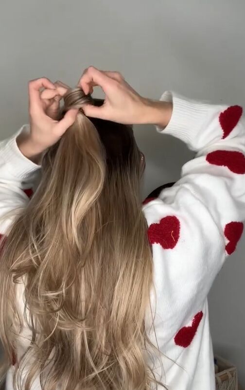 brilliant hack for covering up your ponytail, Pulling tail through