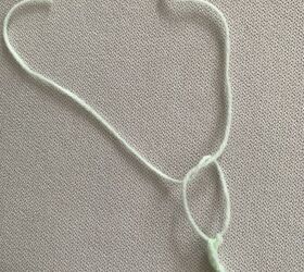 diy your own bow accessory beginner friendly, cut your yarn and tie a double knot