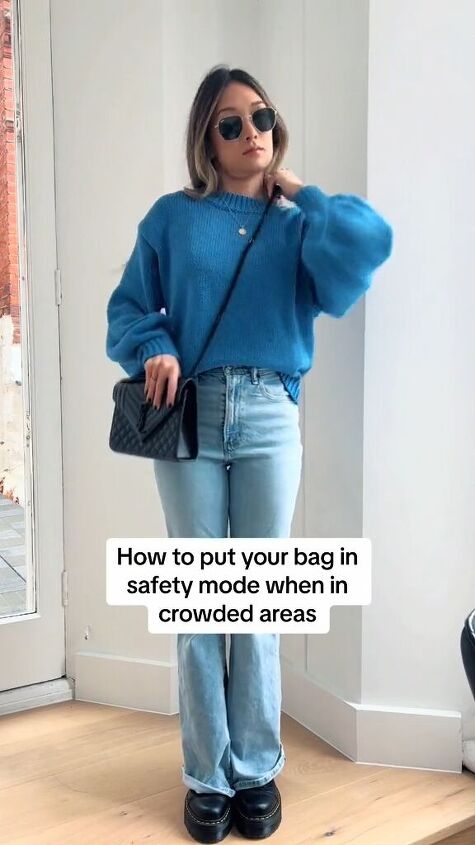 how to securely wear your purse in crowds, Putting bag strap on