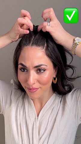 get a higher ponytail with this hack, Splitting hair