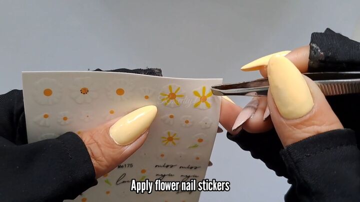yellow flower nails, Applying nail stickers
