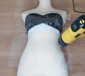 She put an acrylic sheet over a mannequin for this shocking idea that is unlike anything we've seen before