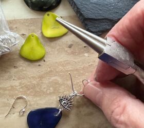 how to create a lovely unique pair of earrings using charms and beads, Putting ear Hooks on